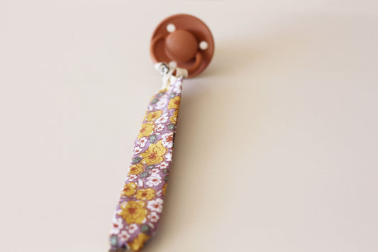 Cuelga chupete Bloom Caléndula