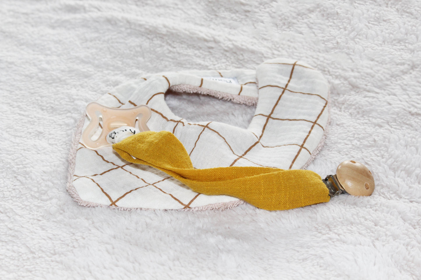 Cuelga chupete Dandelion