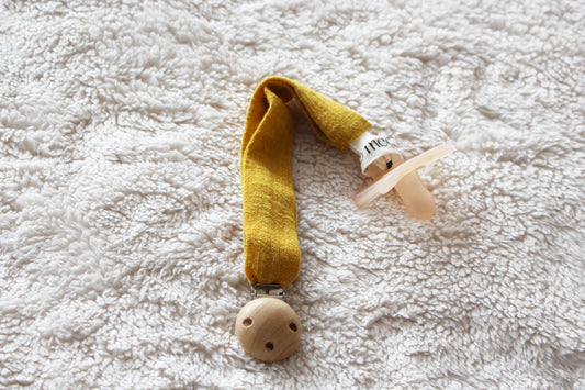 Cuelga chupete Dandelion