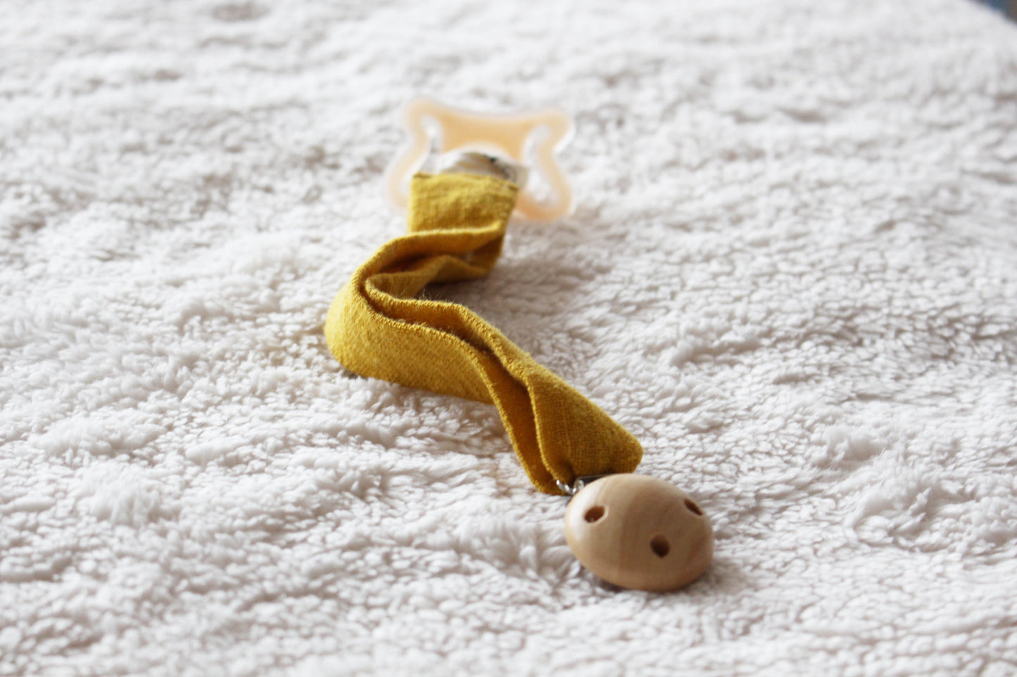 Cuelga chupete Dandelion