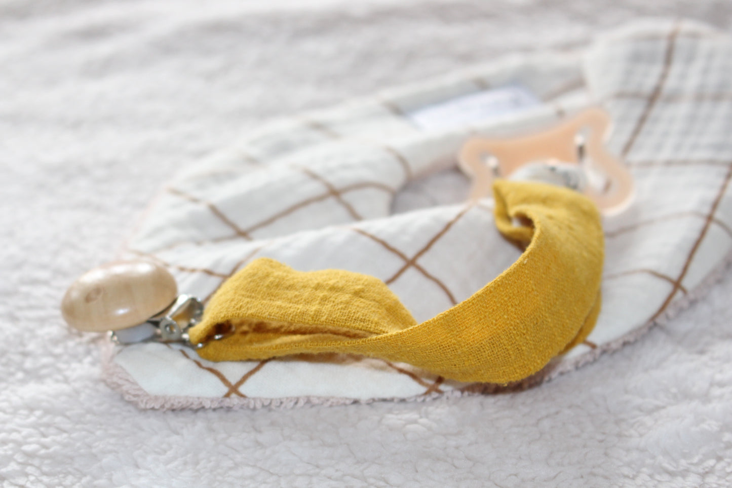 Cuelga chupete Dandelion